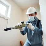Performing closed cell spray foam removal with precision in a clean, well-lit environment.